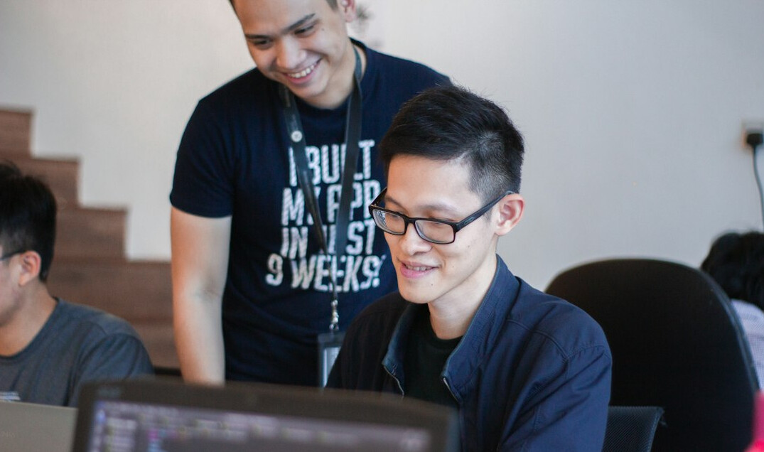 programmers coding together